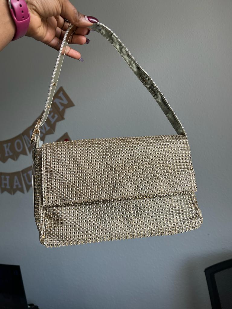 Gold rhinestone party bag from Primark