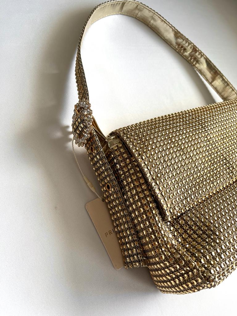 Gold rhinestone party bag from Primark