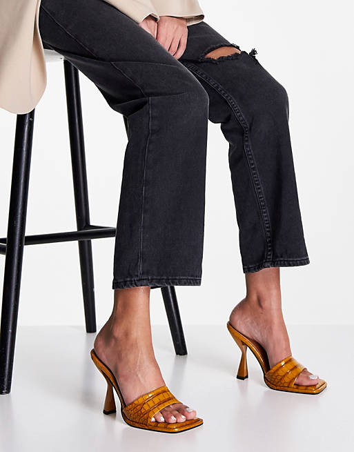 ASOS DESIGN heeled mules in mustard yellow